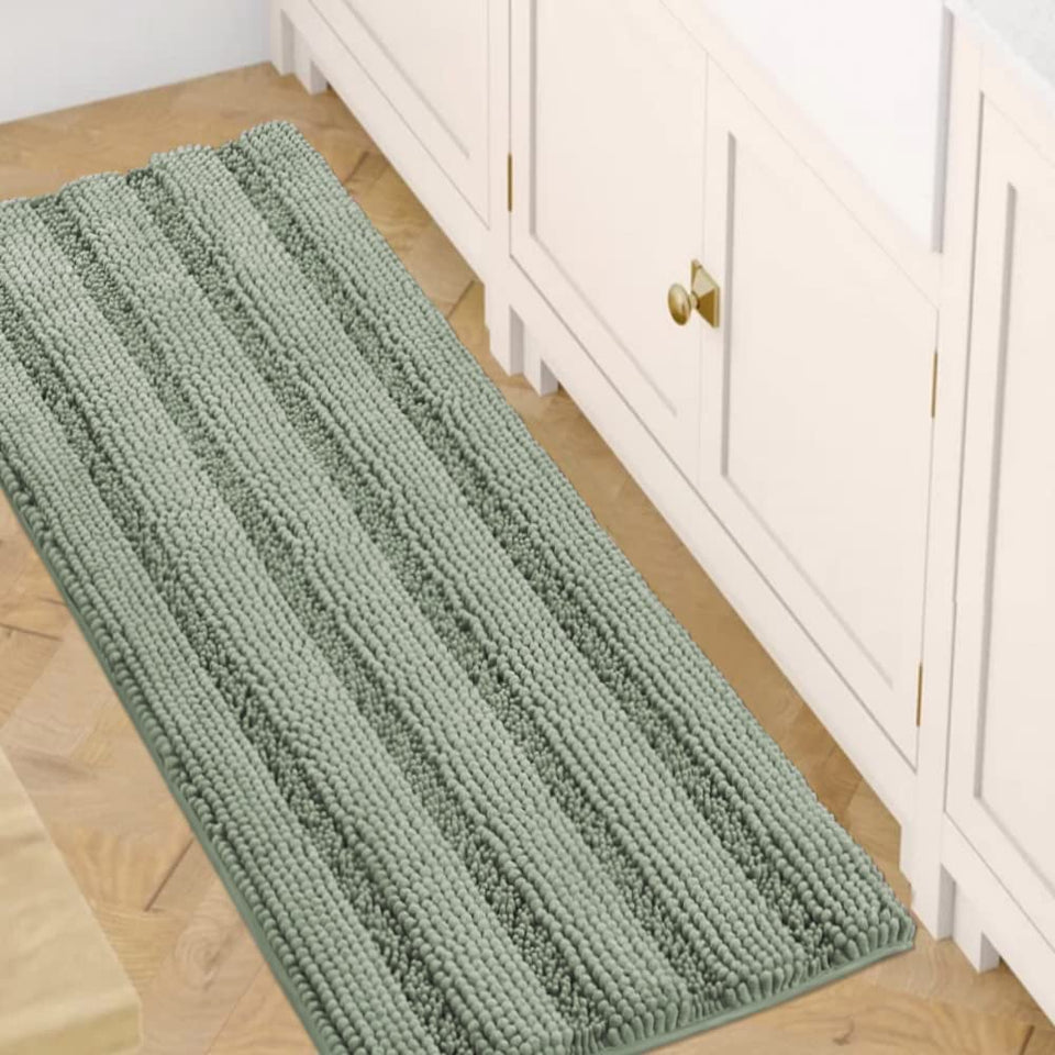 H.VERSAILTEX Sage bath rug with non-slip backing.