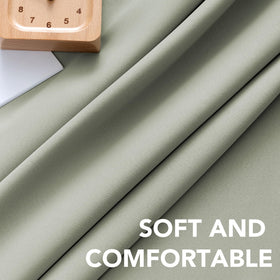 H.VERSAILTEX sage-colored drapes add modern elegance to your space.