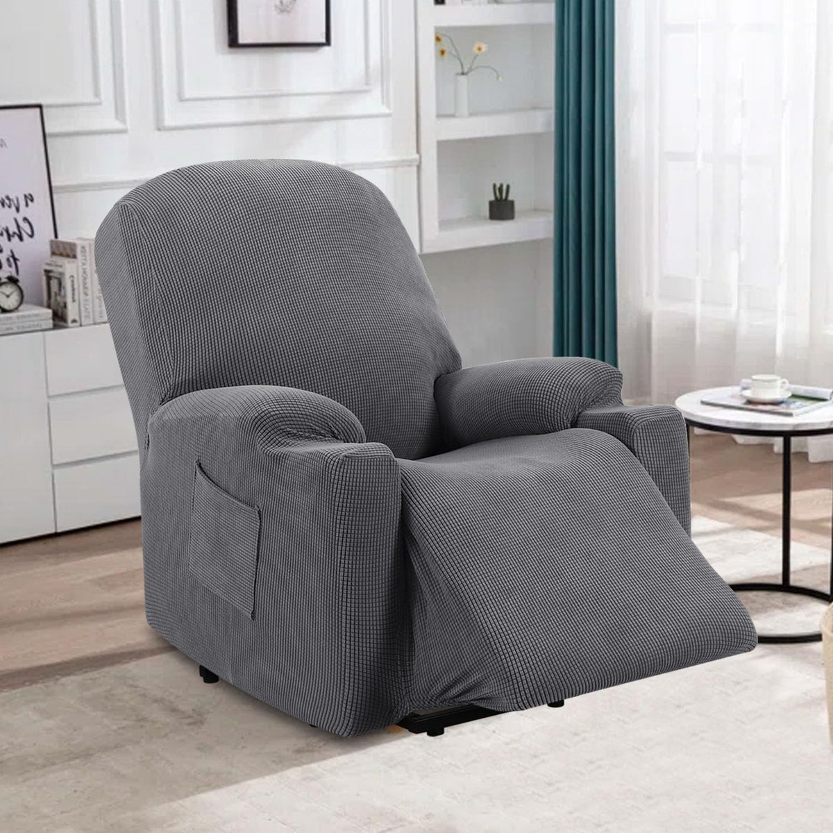 H.VERSAILTEX grey recliner cover rolled up for compact storage and transport.