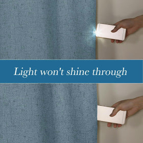 H.VERSAILTEX white backing lining visible on the curtain for enhanced light control.