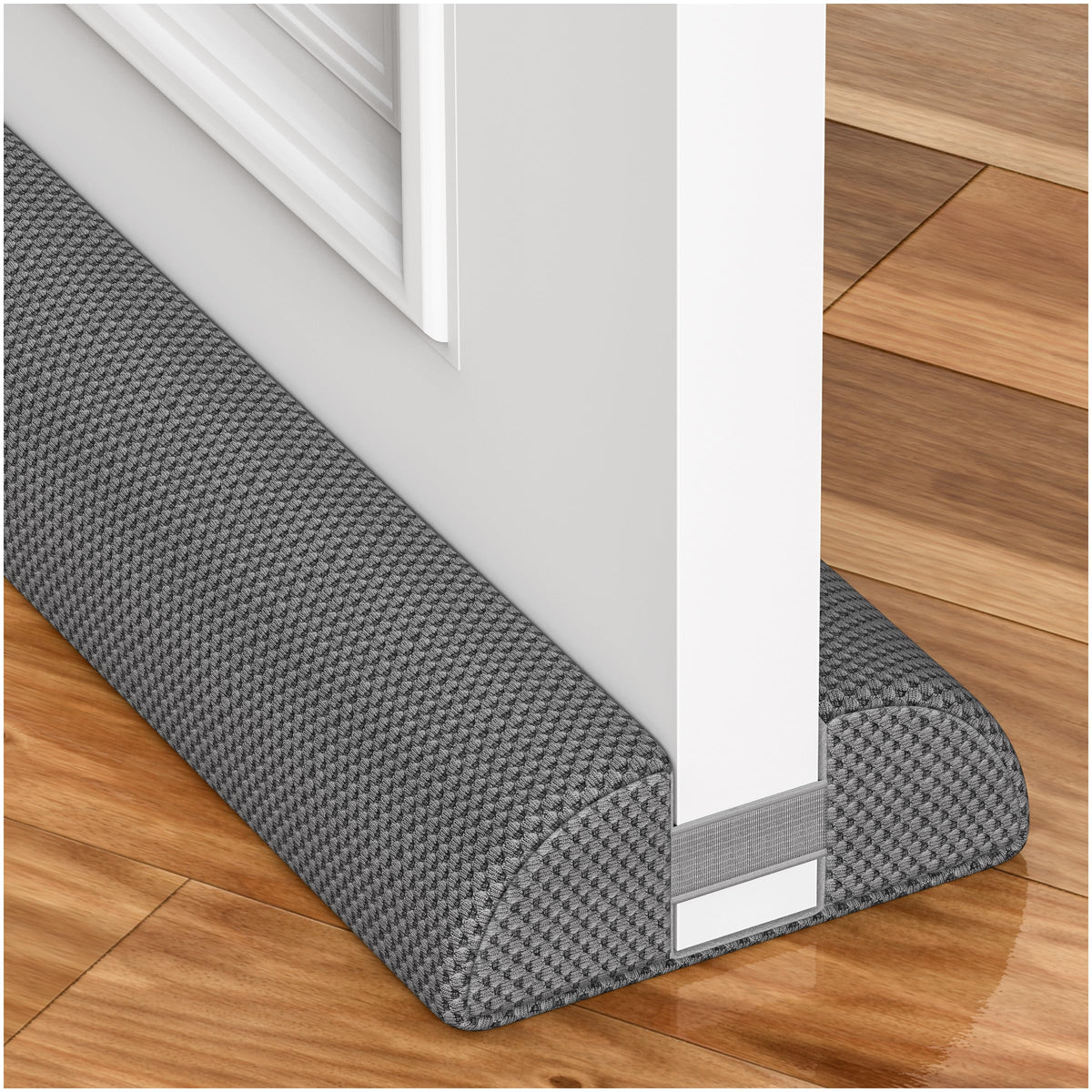 HADOR 30-inch door draft stopper installed under a door to reduce drafts.