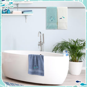 Hahafelt marine-themed towels create a welcoming bathroom touch