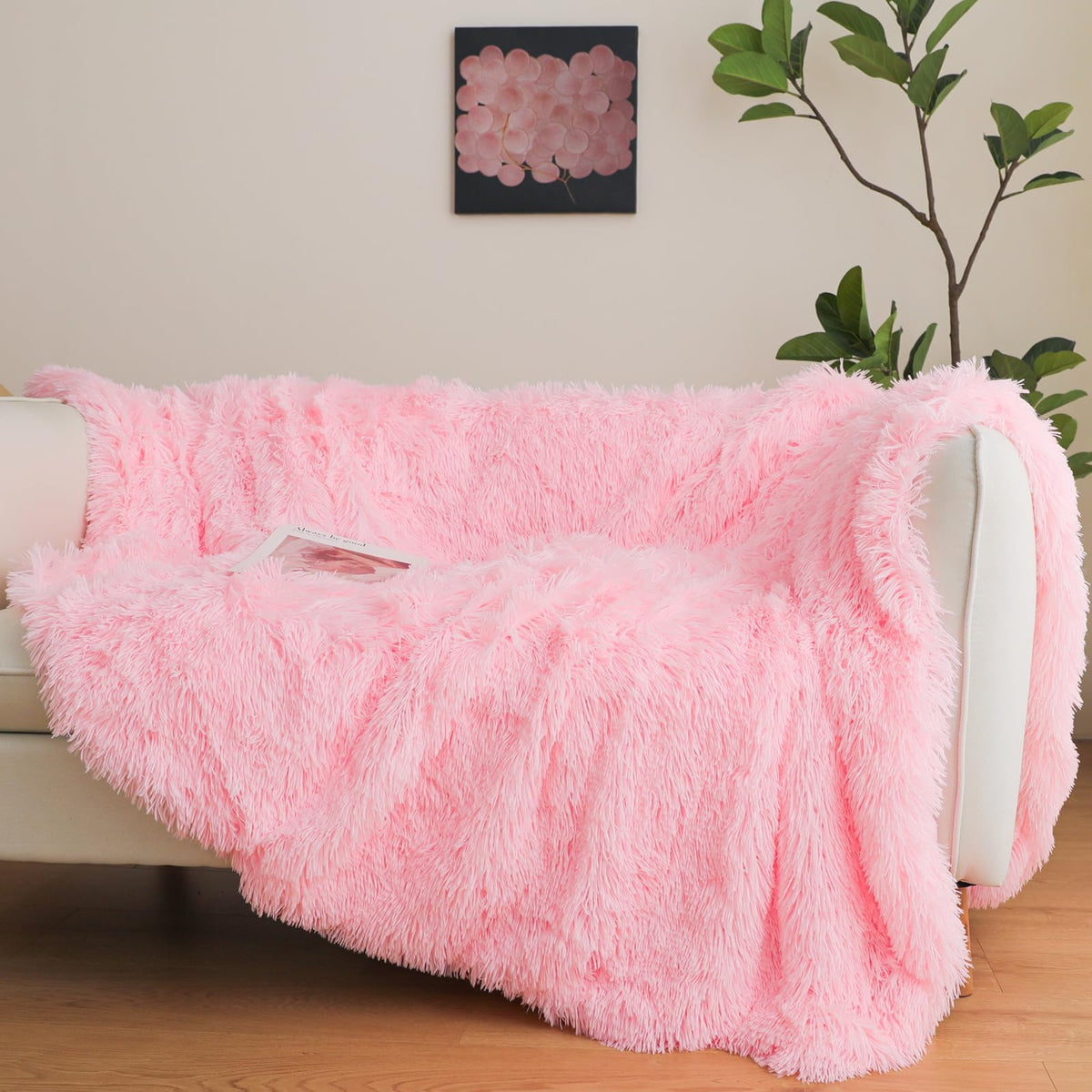 HAIHUA pink fuzzy blanket draped over a chair for cozy styling, 50x60.