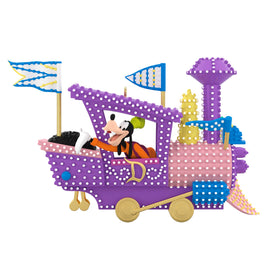 Hallmark Keepsake Disney Electrical Parade ornament lights the tree with vibrant LEDs.