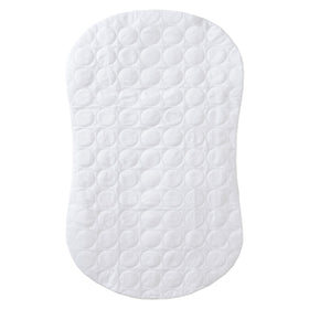 HALO BassiNest cover with hourglass-fit protects bassinet pad from leaks