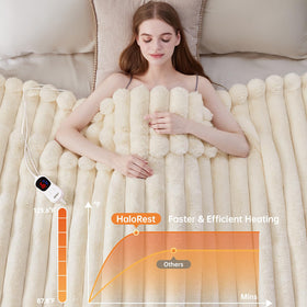 HaloRest heated throw on sofa demonstrates versatile warmth during movie nights.