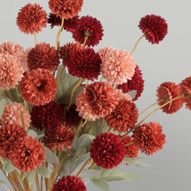 Hananona Kiku mums deep peach provide soft contrast on autumn tables.