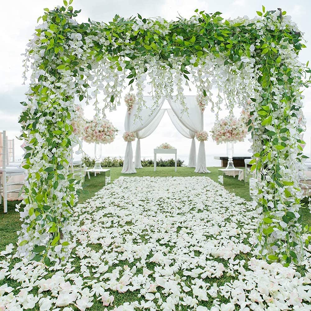 HANDIC Wisteria garland 5-pack 33ft draped over arch for romantic wedding ambiance.