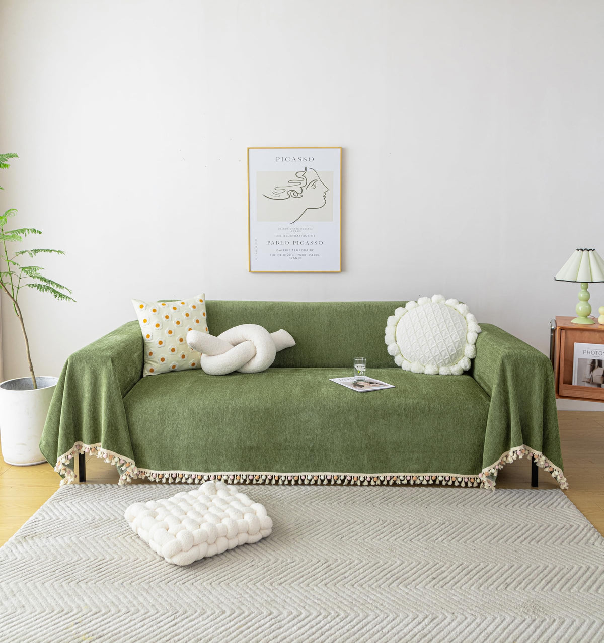 HANDONTIME green chenille sofa cover with tassels protects against pet hair and stains.