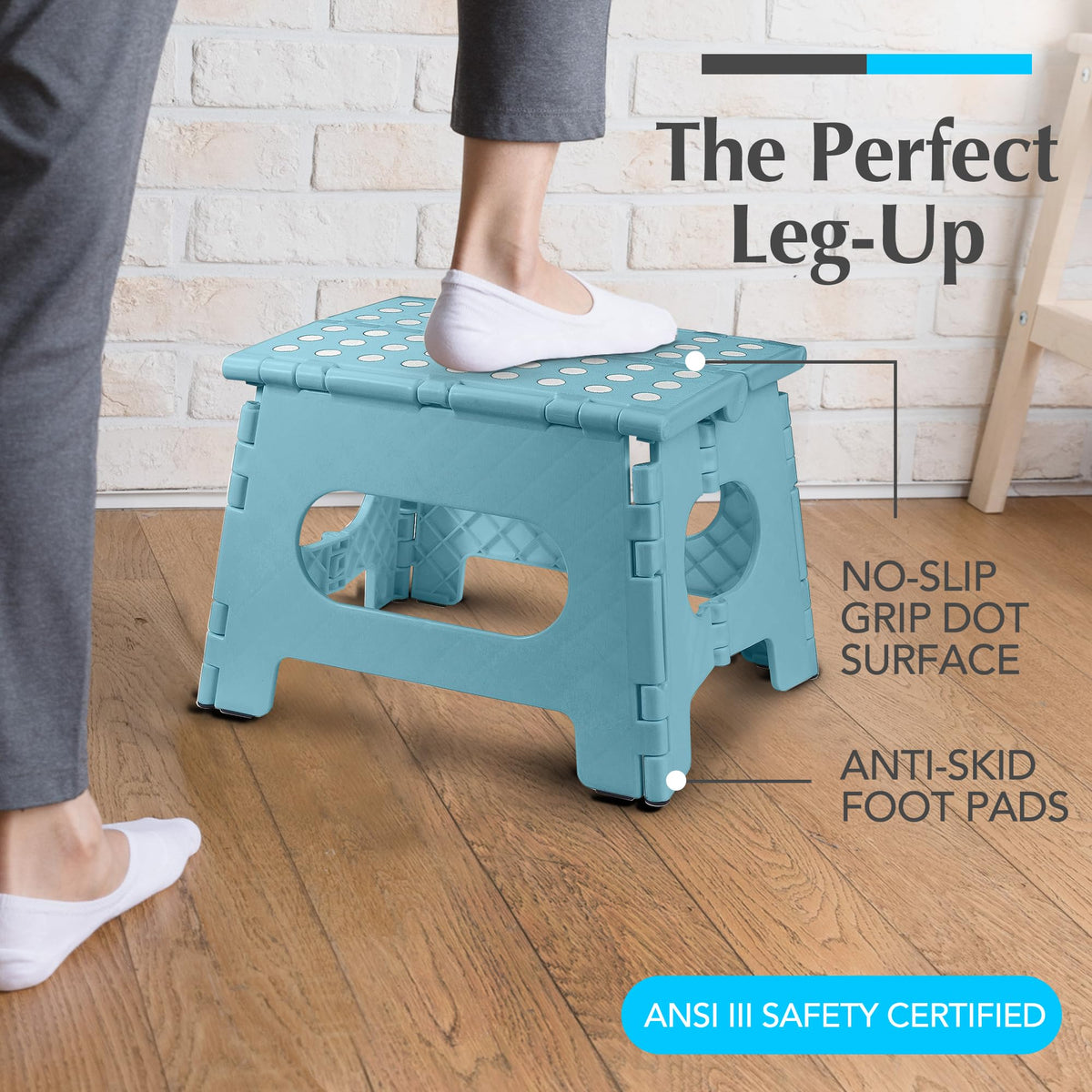 Handy Laundry teal folding stool stored compactly under a cabinet for space saving.