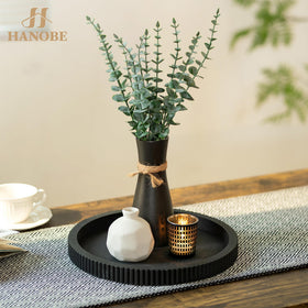 Hanobe candle-plant display tray brings greenery and ambience to shelves.