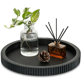 Hanobe decorative tray with scalloped edge elevates coffee-table styling.
