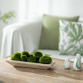 Hanobe dough bowl on dining table as decorative centerpiece with seasonal accents.
