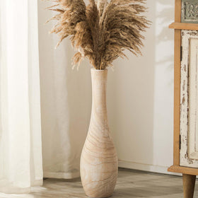 Hanobe 22-inch floor vase in natural wood, bold living room centerpiece idea