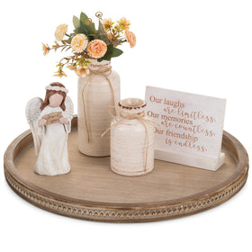 Hanobe round decorative tray with beaded edge on coffee table for chic organization