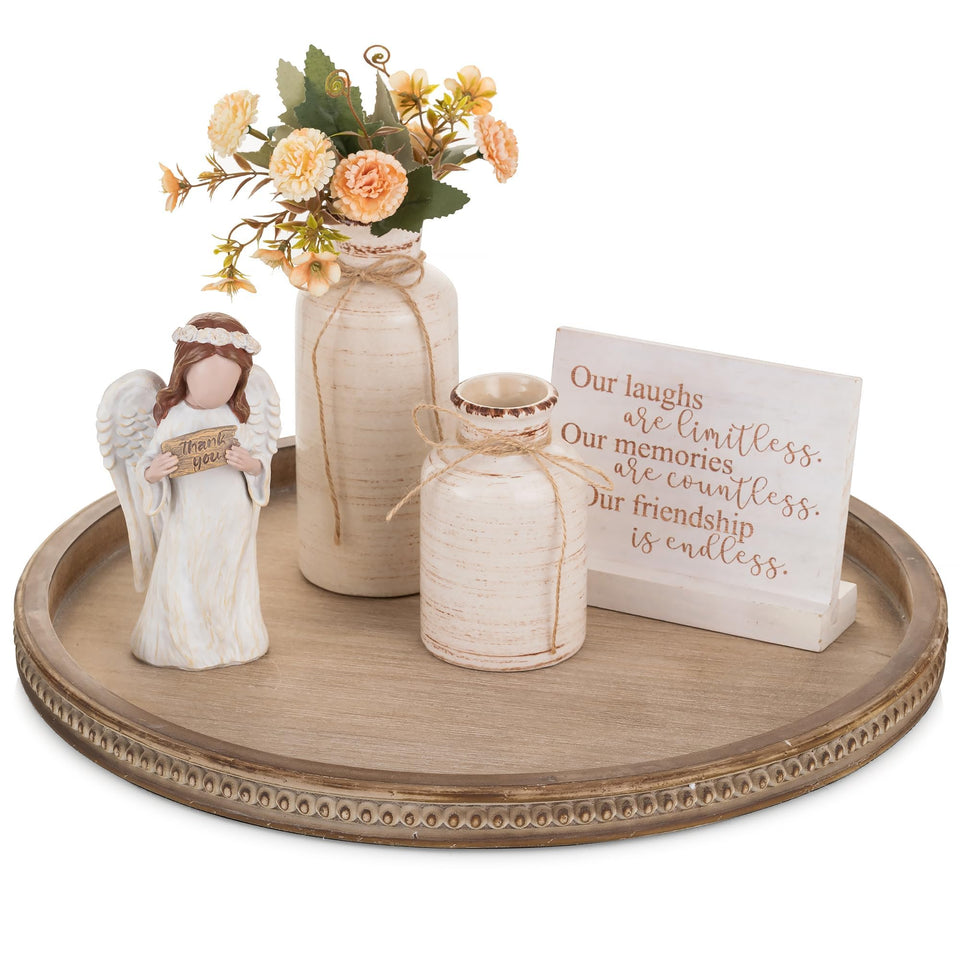 Hanobe round decorative tray with beaded edge on coffee table for chic organization