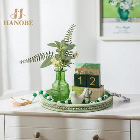 Hanobe Sage Green Tray with Beaded Edge adds delicate detail to a coffee table