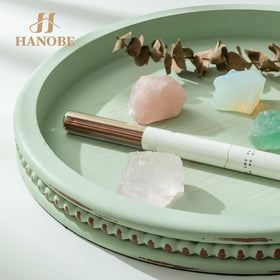 Hanobe Sage Green Tray with a floral vase for dining or living spaces