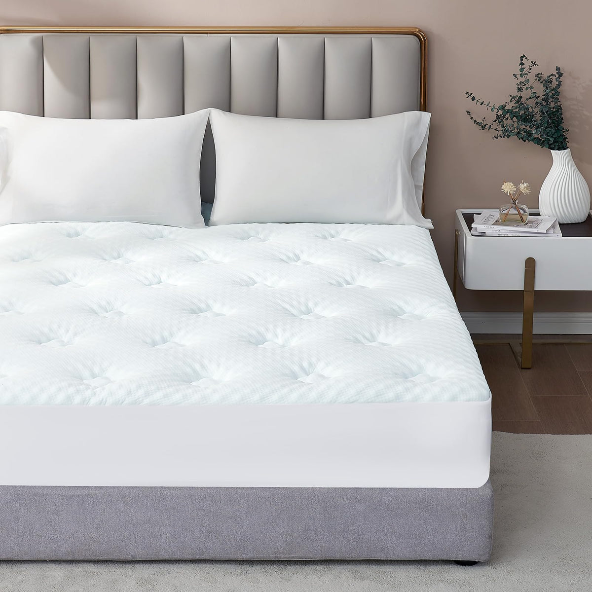 Hansleep queen-topper in-use on bed demonstrates comfortable support
