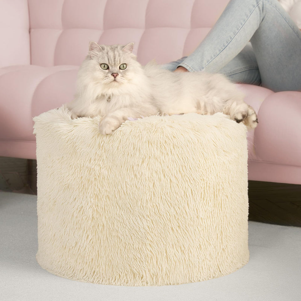 Hansleep round pouf ottoman with foam-filled core for supportive footrest.