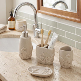 Haocoott toothbrush holder keeps brushes upright, reducing vanity clutter.