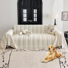 HAOMAIJIA non-slip couch cover placed on a sofa protecting upholstery and staying in place