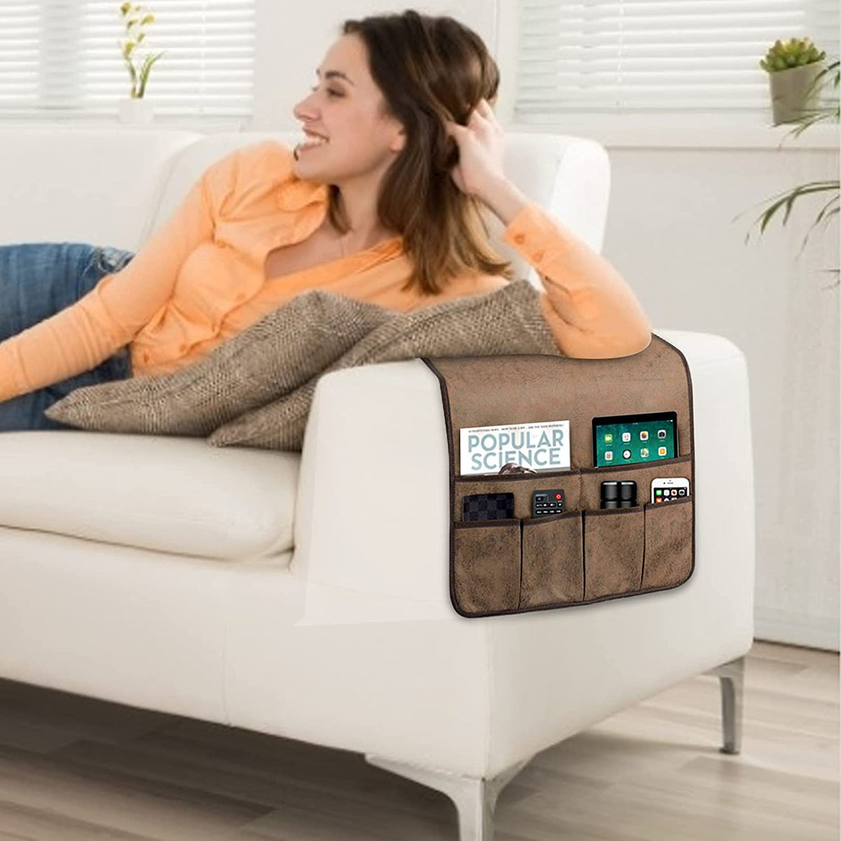 HAOMAIJIA organizer in living room usage illustrates easy access to remotes and tablets.