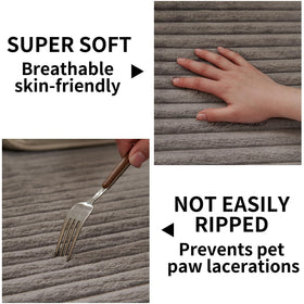 HAOMAIJIA three-cushion sofa protector in grey blends with any decor.