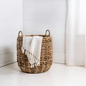 Care instructions for the Happimess Laurel Bohemian basket with mild cleaning.