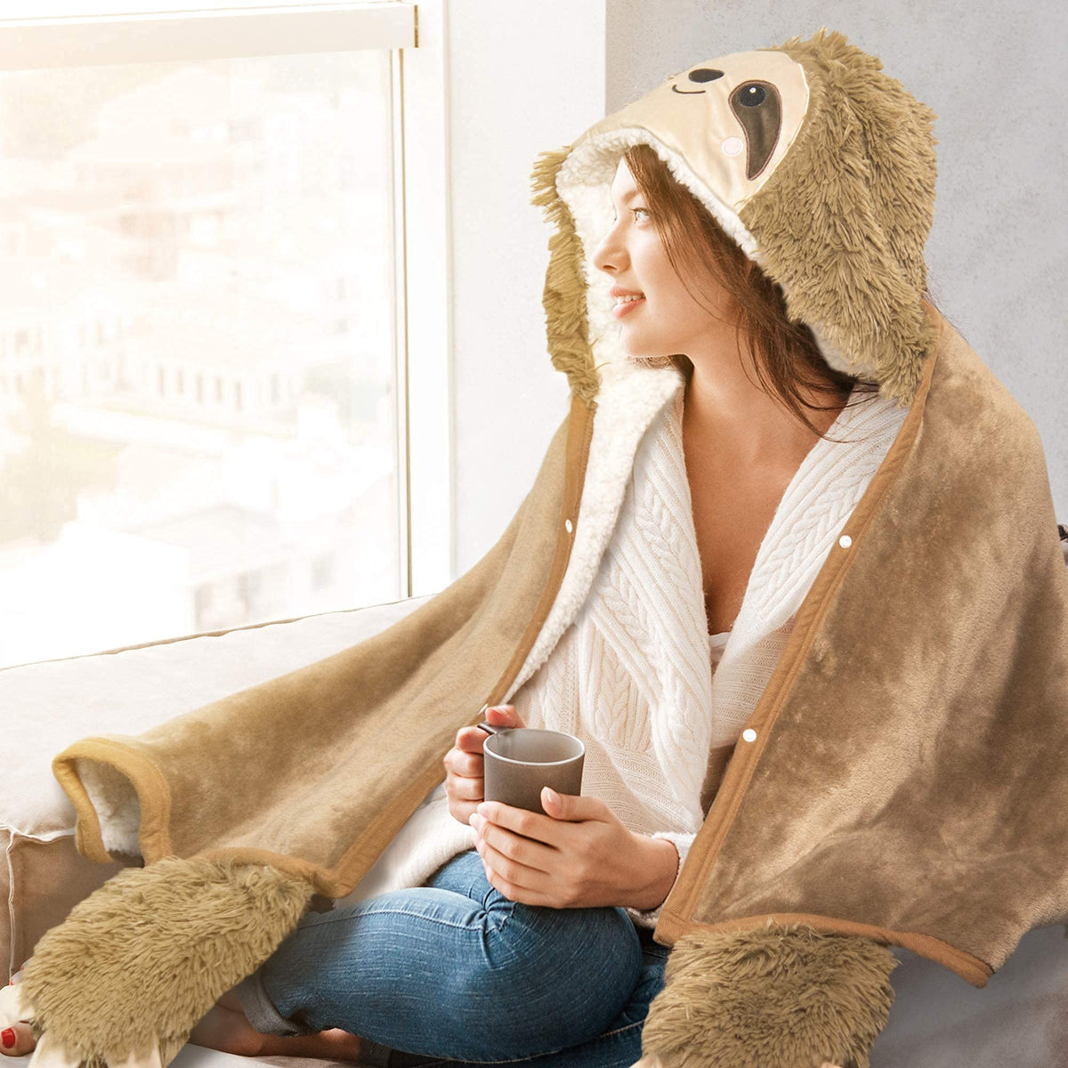 Happy Fuel Sloth wrap in an office setting, wearable warmth while working