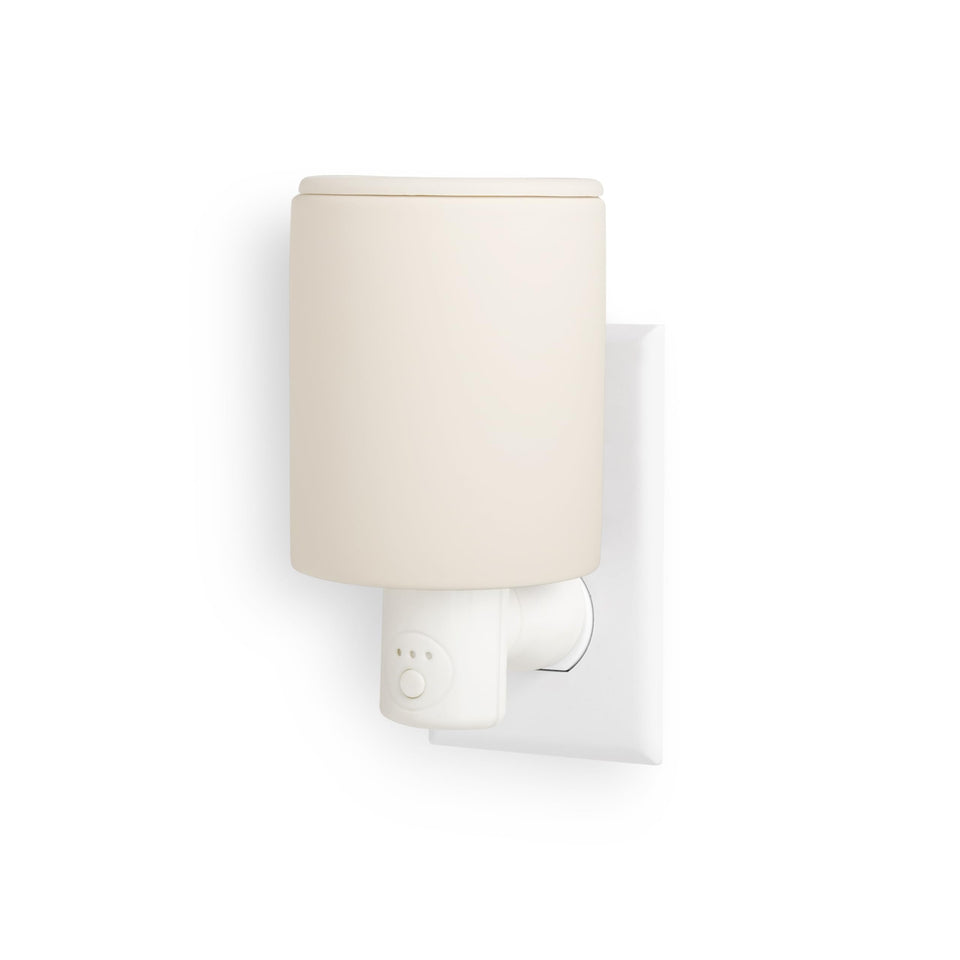 Happy Wax Bone outlet timer warmer compact ceramic wall plug for small spaces.