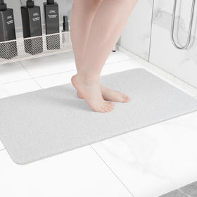 Hargiis non-slip bathtub mat in white with secure anti-slip backing.