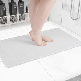 Hargiis non-slip bathtub mat with checkered backing for safer, slip-free baths.