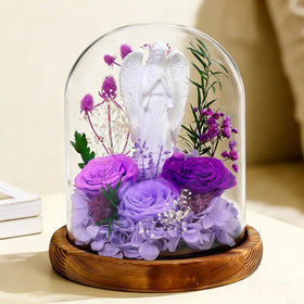 Harmolia preserved real rose in glass dome with angel statue for lasting beauty.