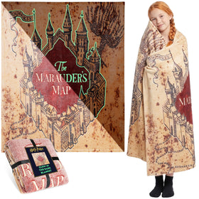 Harry Potter glow blanket showcases soft fleece texture for cozy snuggles.