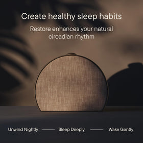 Hatch Restore 3 Cocoa in a dark room with a gentle nightlight