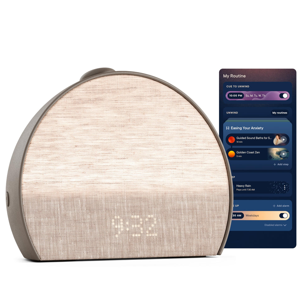Hatch Restore 3 Cocoa on nightstand with sunrise alarm guiding morning light