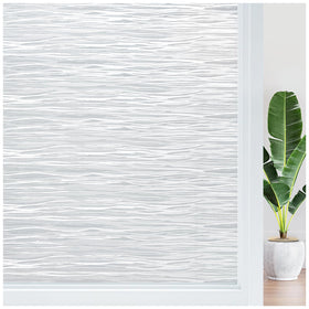 Haton privacy film with frosted texture adds soft daytime privacy.