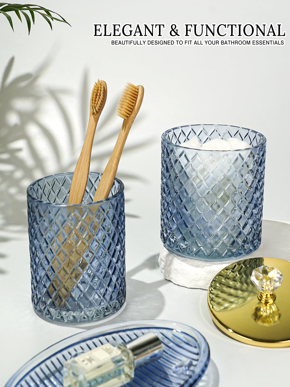 Haturi blue glass Q-tip holder organizes vanity neatly.