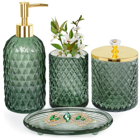 Haturi sage green glass lotion dispenser with drip-free pump for a clean bathroom.