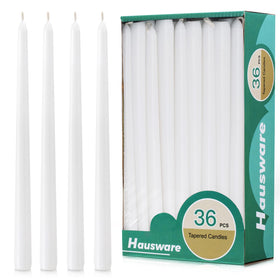 Hausware 36-pack taper candles in white on an elegant table setting for clean burn