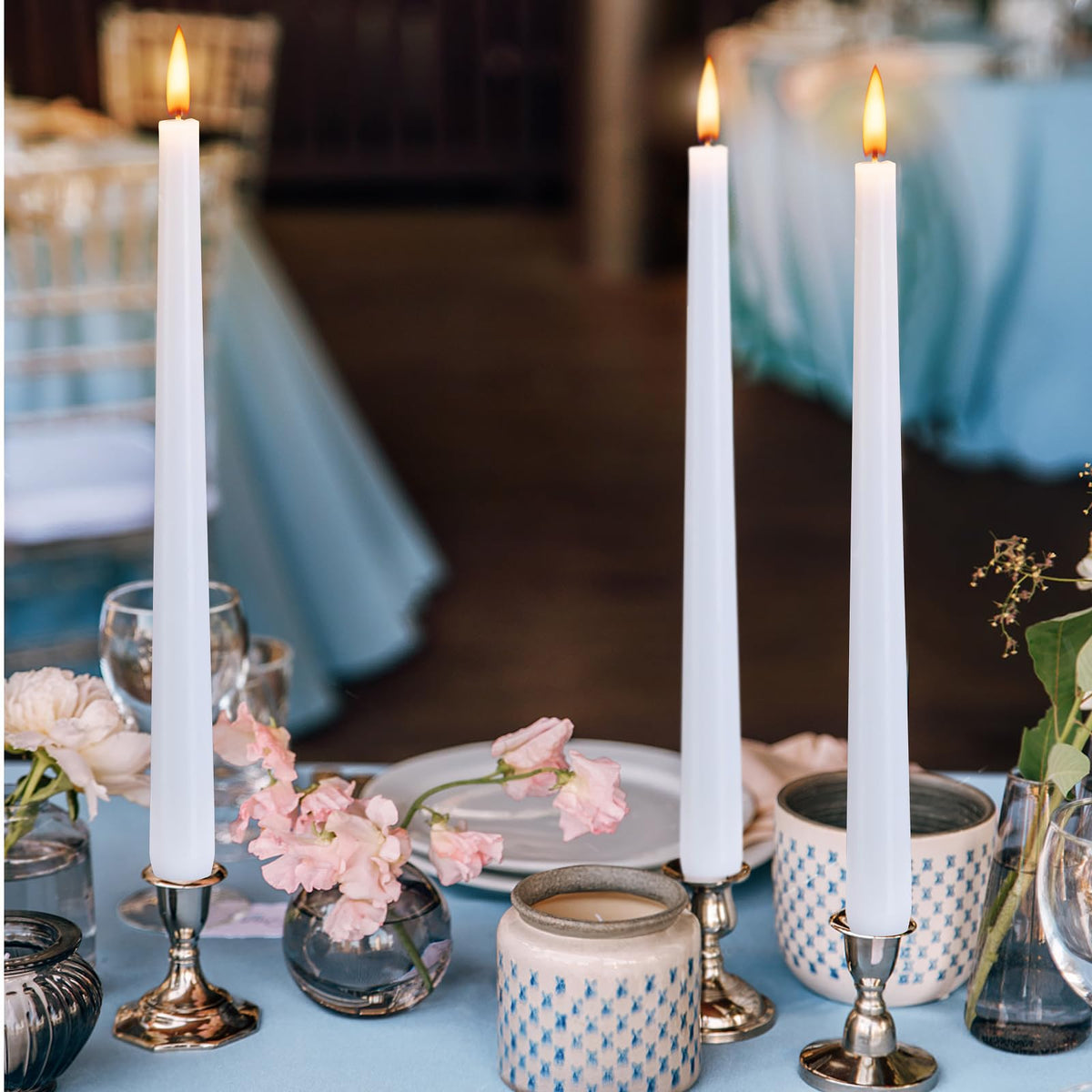Hausware premium taper candles featured in a centerpiece display