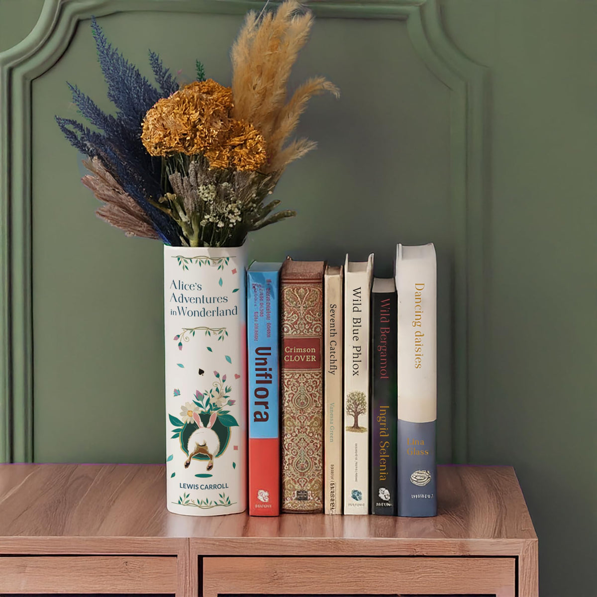 Hazel & Harold's book vase features ribbed detailing and glazed finish.