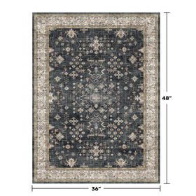 Close-up of ash charcoal floral design on Hazo Haus rug