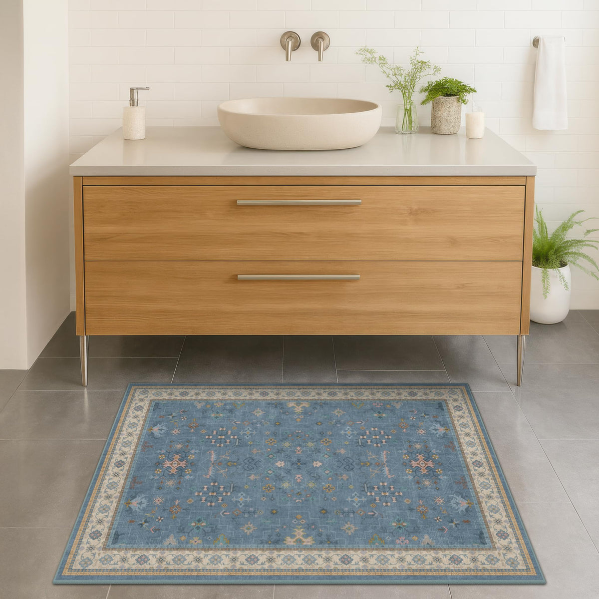 Hazo Haus blue 2x3 rug with non-slip backing keeps bathroom floors secure.