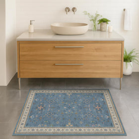 Hazo Haus blue 2x3 rug with non-slip backing keeps bathroom floors secure.