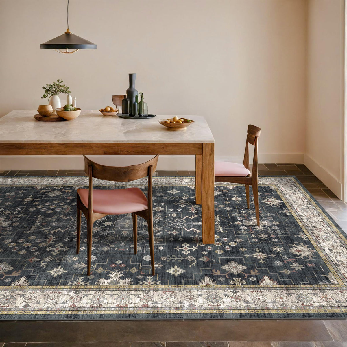 Hazo Haus Boho dining rug 6x9 in black adds warmth and a cozy dining room focal point.