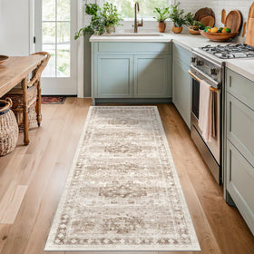 Hazo Haus rug pattern close-up shows floral geometric design in beige latte