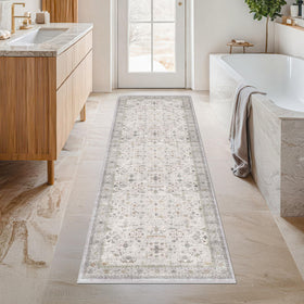 Hazo Haus light grey 2x5 boho rug with a floral pattern adds soft charm to entryways.