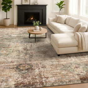 Moss green colorway of Hazo Haus rug complements rustic interiors.